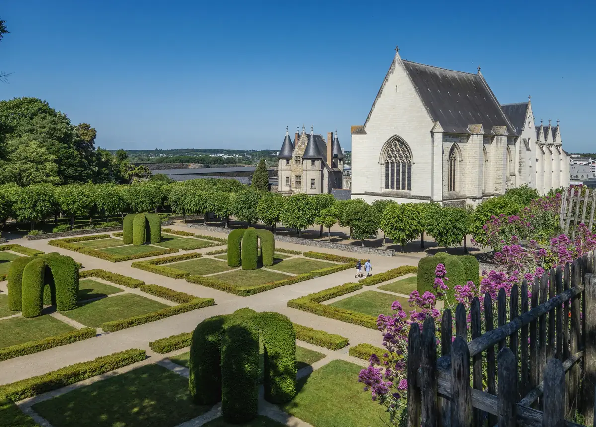 The chapel and the courtyard garden of clipped yews inside the walls of the Château d'Angers